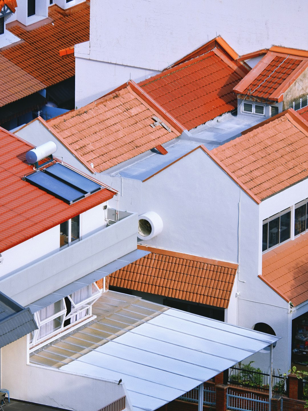 tiled-rooftops-of-residential-houses-under-sunlight-wjpq-h-eh7k